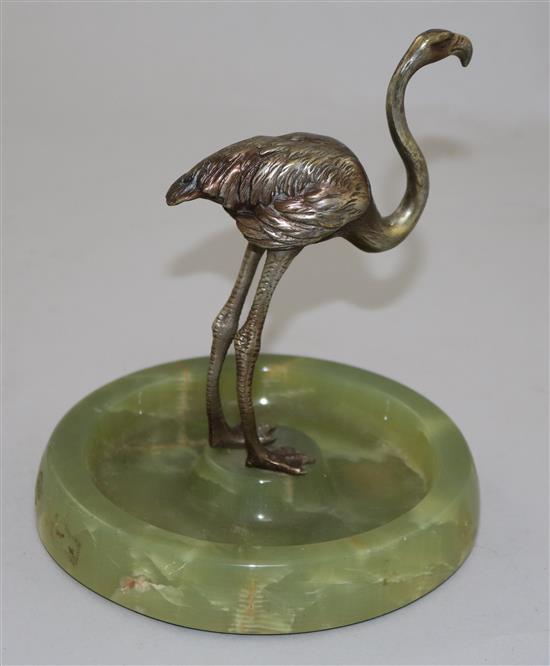 An early 20th century silvered bronze and green onyx ashtray, 6in.